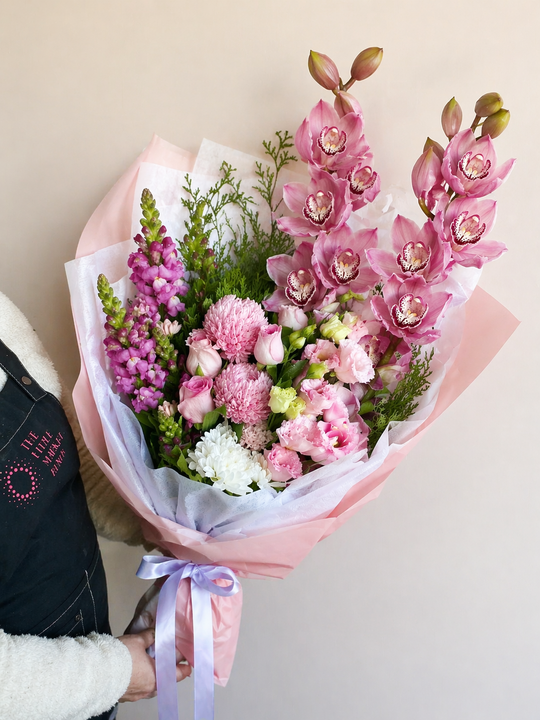 
                  
                    Cymbidium Orchid Bouquet
                  
                