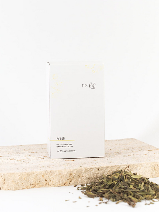 
                  
                    White box labeled 'P.S.' with green tea leaves on a white background
                  
                