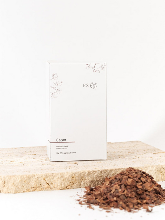 
                  
                    Cacao powder packaging on a wooden surface with a white background
                  
                