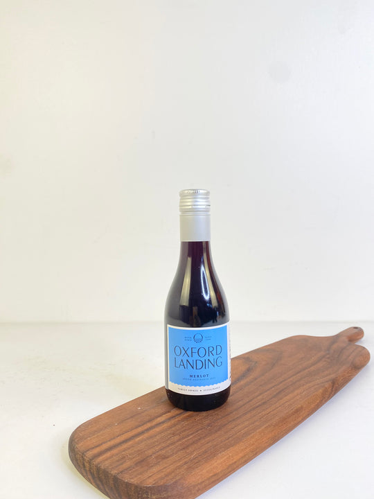 
                  
                    Bottle of Oxford Landing wine on a wooden board with a white background
                  
                