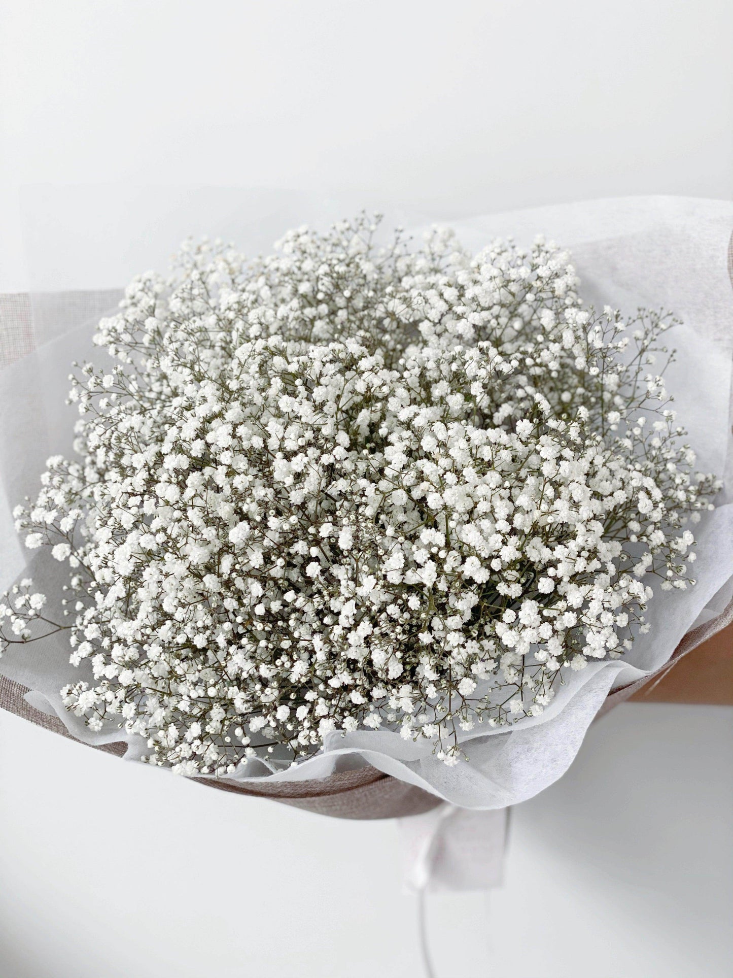 
                  
                    Fairy light Baby Breath Bouquet shot by The Little Market Bunch in Melbourne.
                  
                