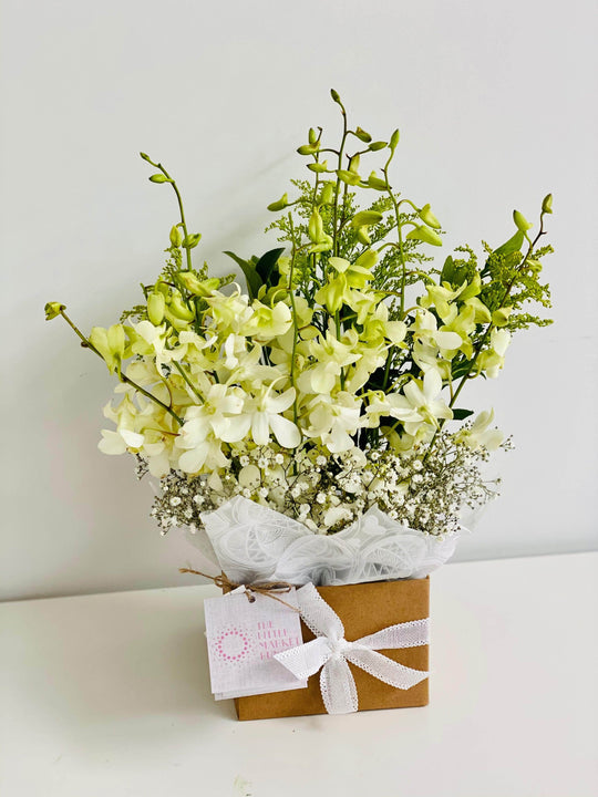 
                  
                    White Orchid Box shot by The Little Market Bunch in Melbourne.
                  
                