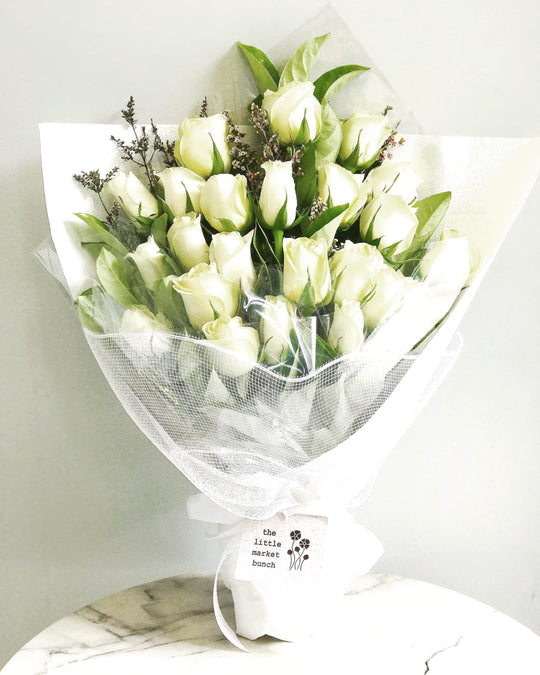 
                  
                    White Roses shot by The Little Market Bunch in Melbourne.
                  
                