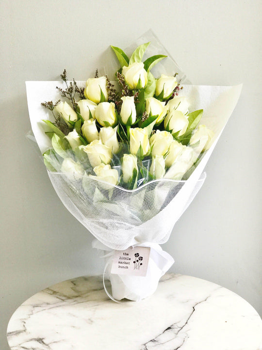 
                  
                    White Roses shot by The Little Market Bunch in Melbourne.
                  
                